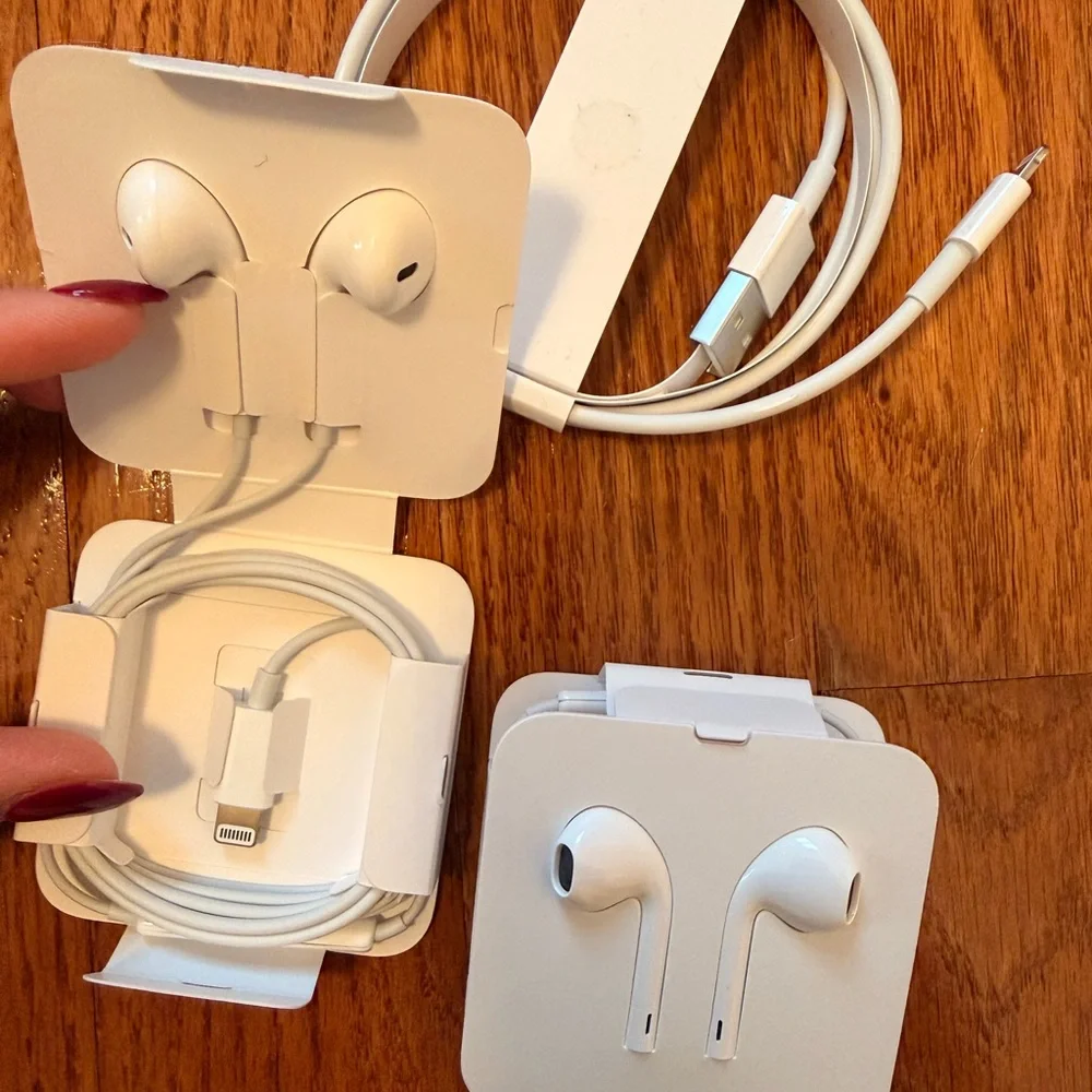 White Wired Earphones and Charging Cable